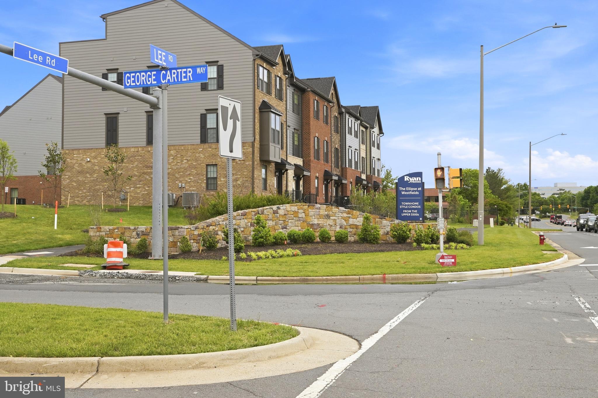 14538 George Carter Way, Unit 287 Chantilly, VA 20151 - Photo 87 of 87 a view of a white building with a yard
