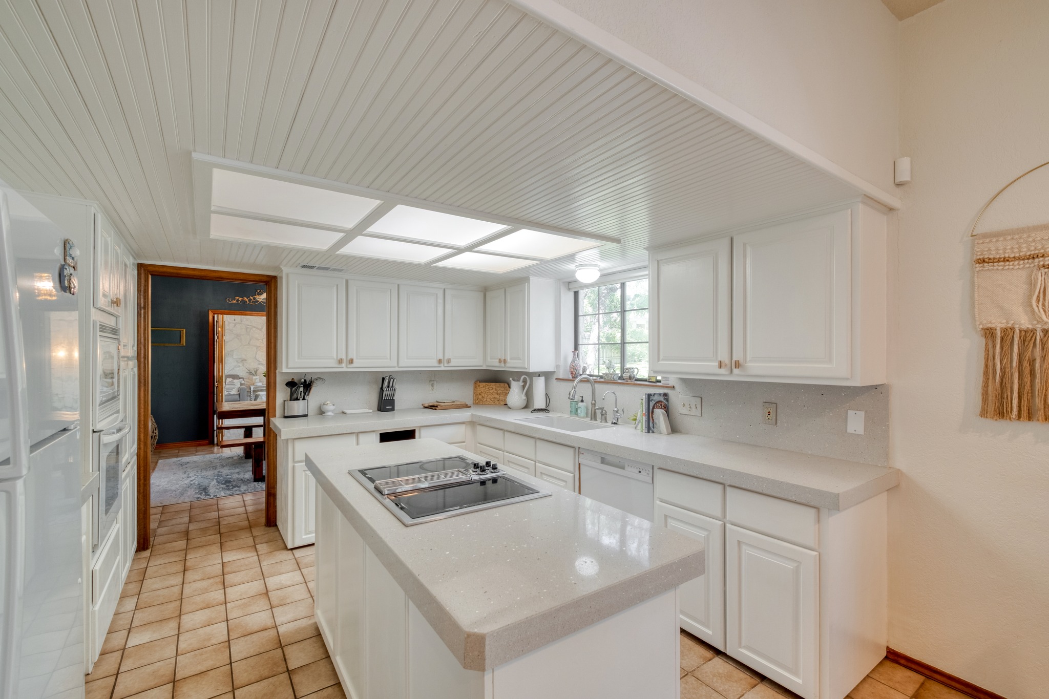 202 Ridgewood Drive Georgetown, TX 78628 - Photo 11 of 40 a kitchen that has a sink and a stove in it