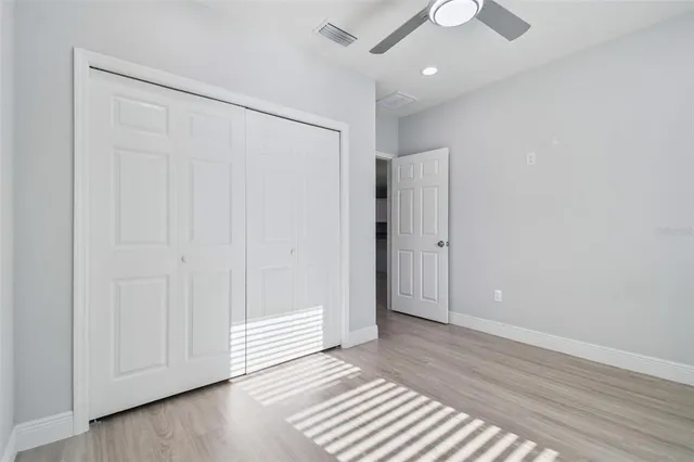 a view of a livingroom with wooden floor