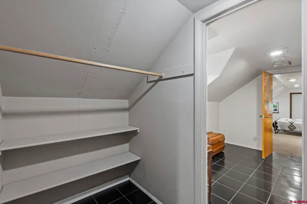 a bathroom with a toilet sink and shower