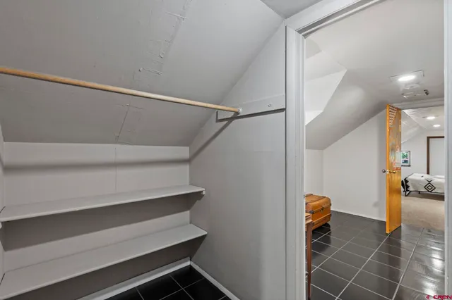 a bathroom with a toilet sink and shower