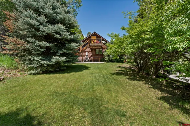 a picture of a bathroom with a shower