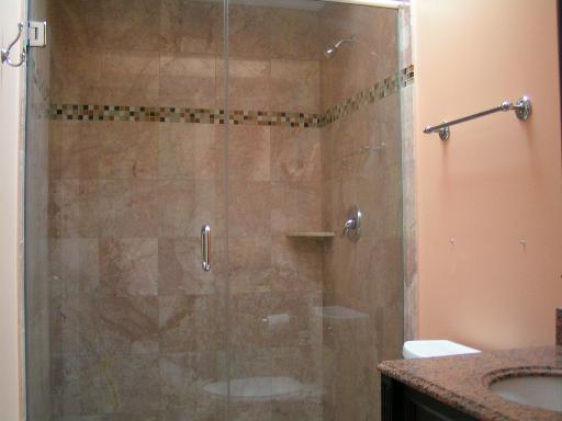 6909 Beckwith Road Morton Grove, IL 60053 - Photo 11 of 16 a bathroom with a granite countertop shower and a sink