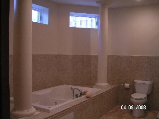 6909 Beckwith Road Morton Grove, IL 60053 - Photo 13 of 16 a bathroom with a sink and a toilet