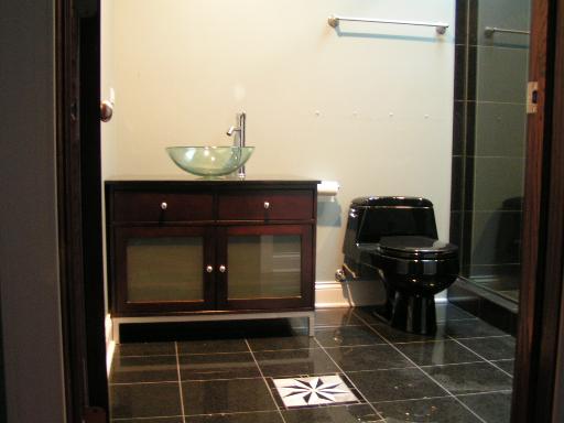 6909 Beckwith Road Morton Grove, IL 60053 - Photo 8 of 16 a bathroom with a toilet