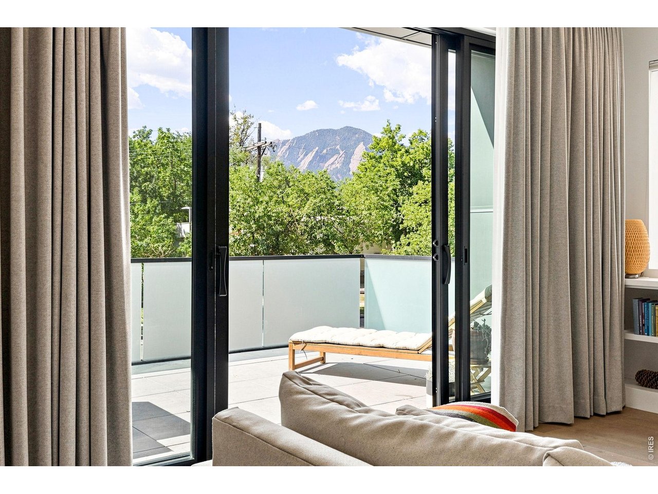 2467 Walnut Street Boulder, CO 80302 - Photo 3 of 49 The Flatirons framed perfectly from the living room, downtown Boulder at your doorstep