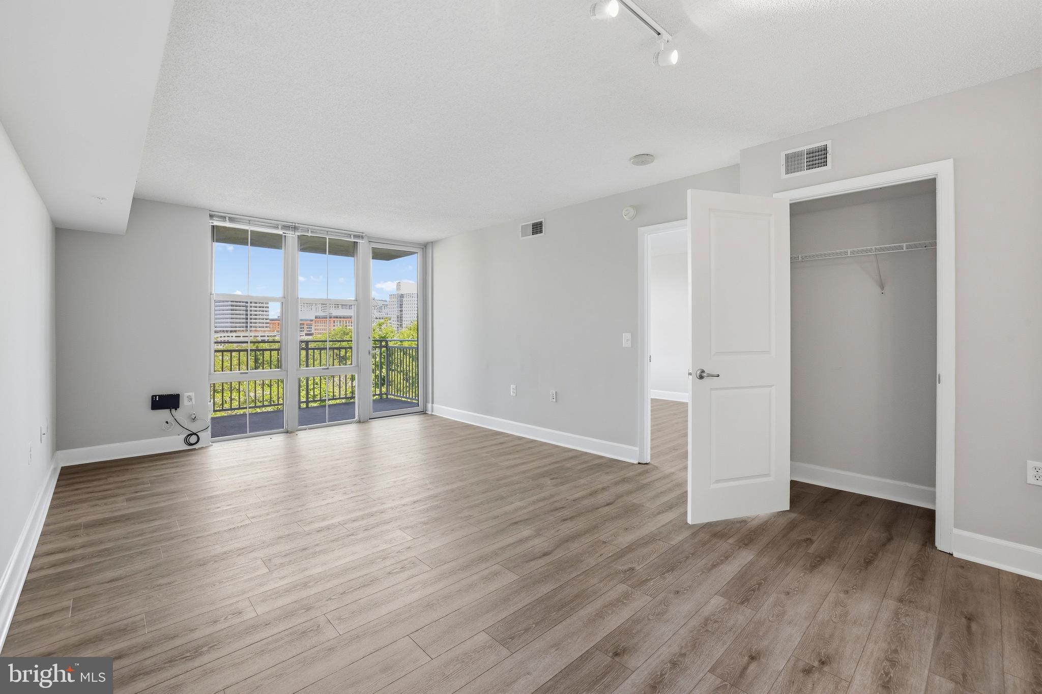 11800 Sunset Hills Road, Unit 910 Reston, VA 20190 - Photo 11 of 46 Family Room leads out to Balcony