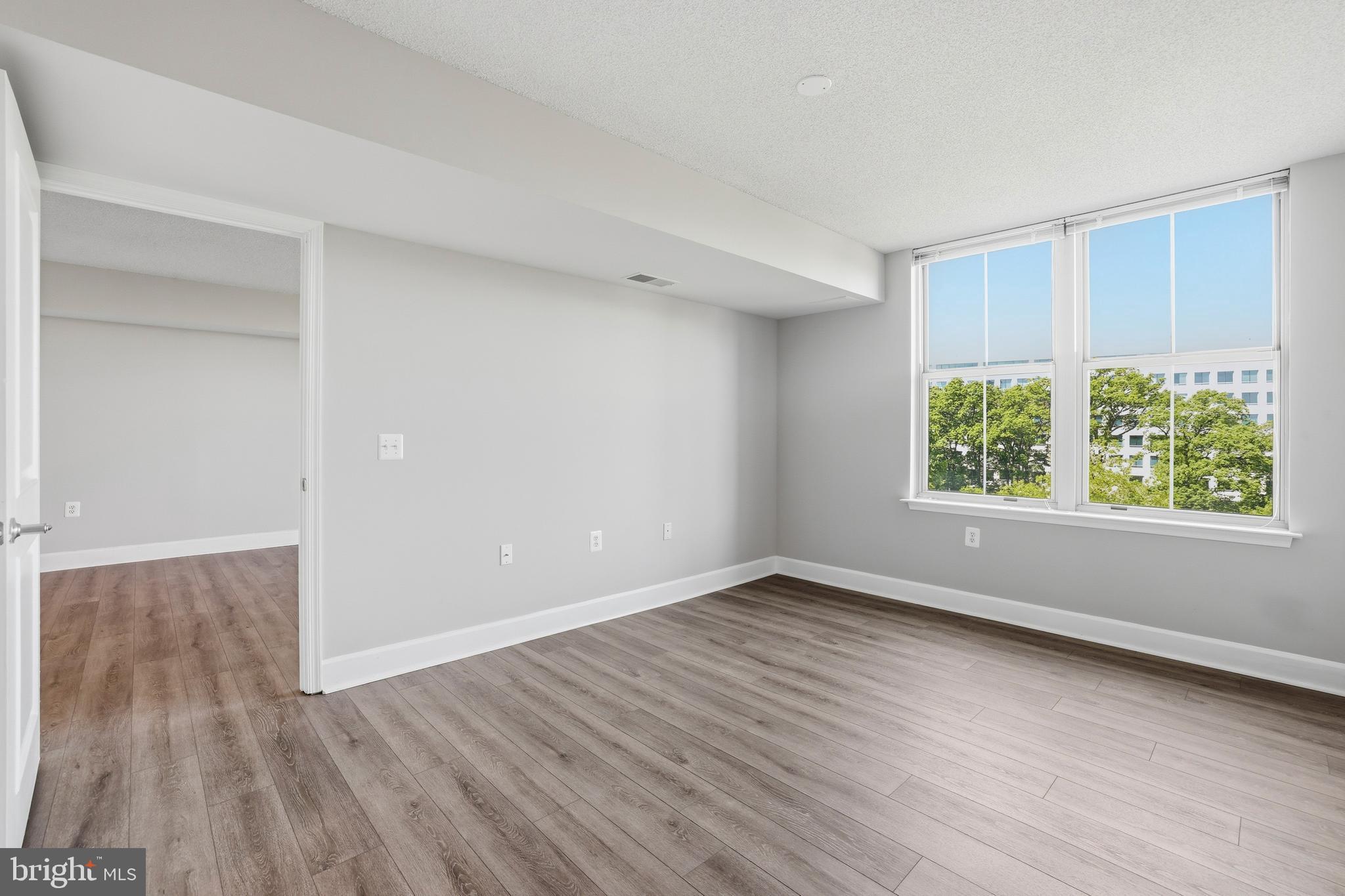 11800 Sunset Hills Road, Unit 910 Reston, VA 20190 - Photo 16 of 46 Spacious Bedroom