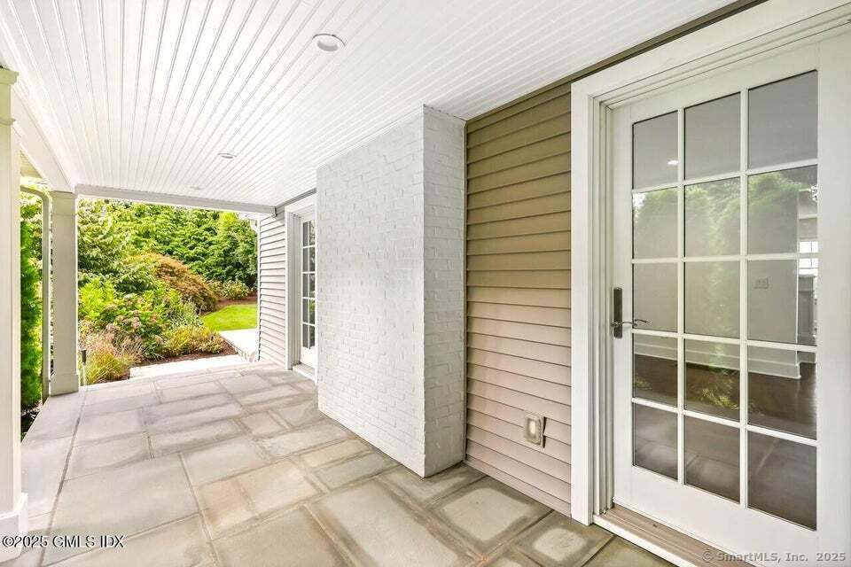 2 Sound View Terrace Greenwich, CT 06830 - Photo 12 of 39 a view of a house with a large window