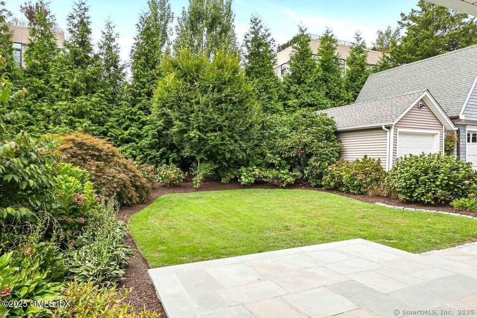 2 Sound View Terrace Greenwich, CT 06830 - Photo 16 of 39 a view of backyard with green space
