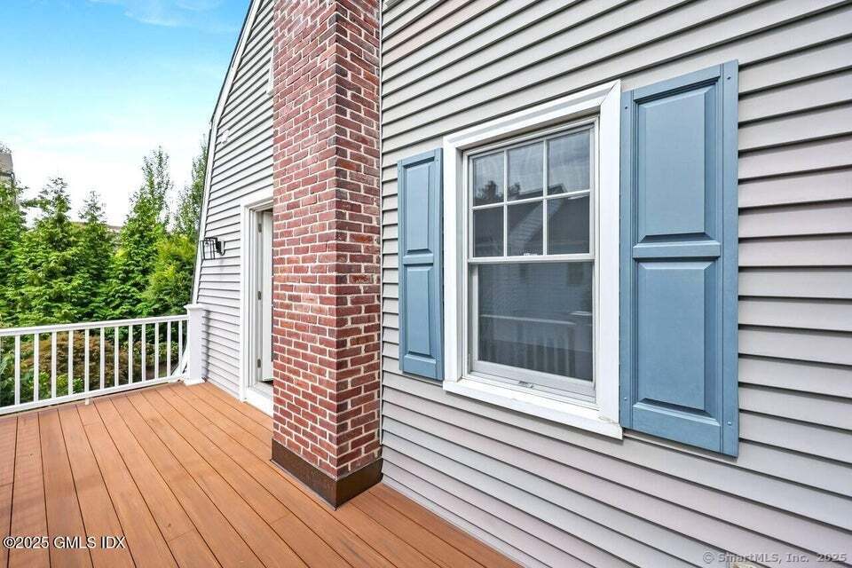 2 Sound View Terrace Greenwich, CT 06830 - Photo 18 of 39 a view of a balcony with wooden floor