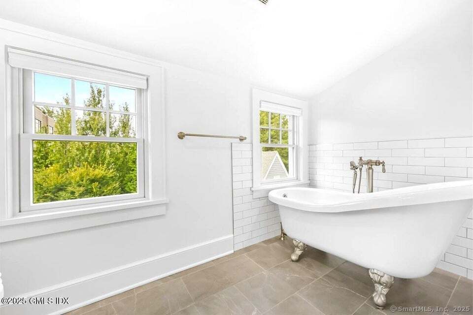 2 Sound View Terrace Greenwich, CT 06830 - Photo 29 of 39 a bathroom with a sink and a window