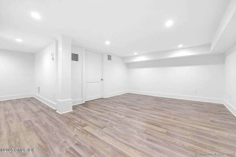 2 Sound View Terrace Greenwich, CT 06830 - Photo 31 of 39 a view of empty room with wooden floor