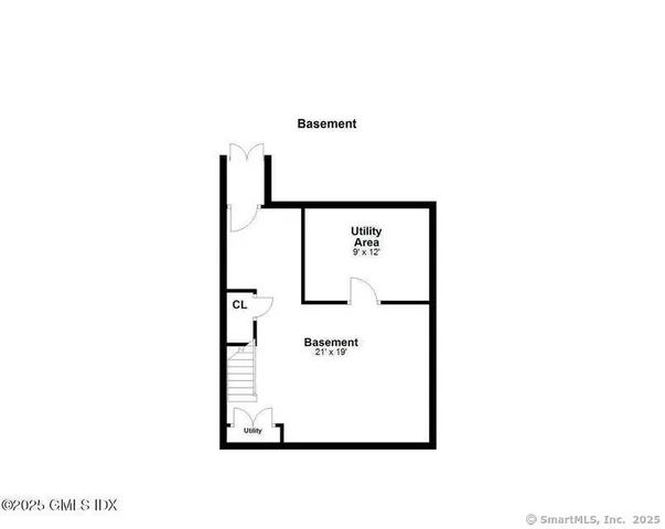 a picture of a bench in front of a wall