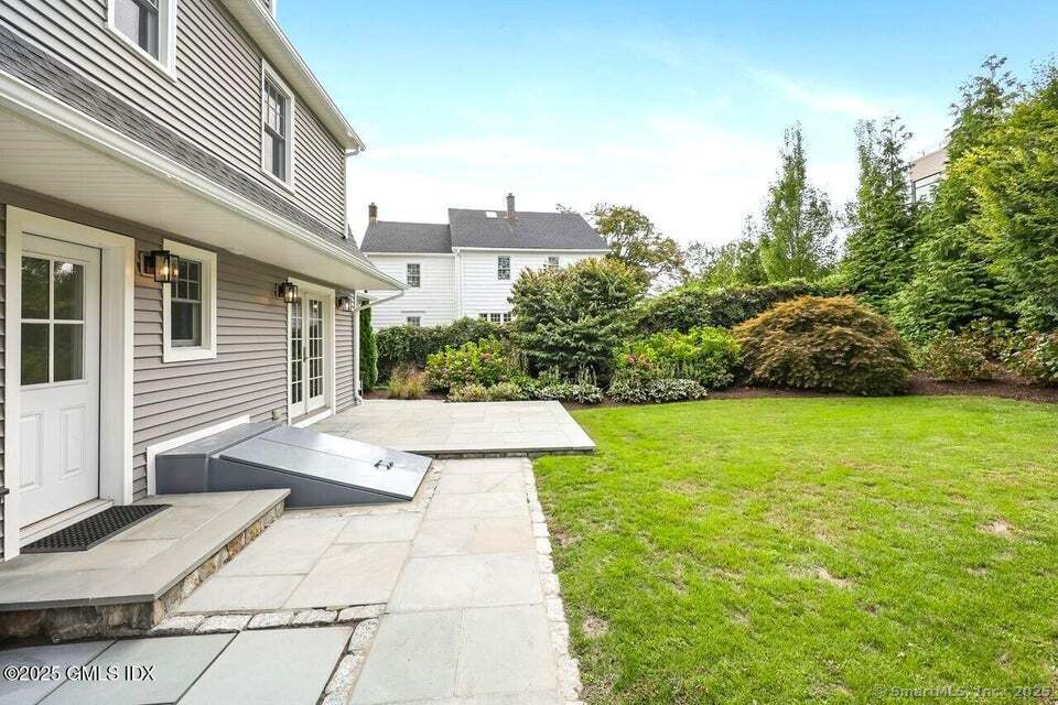 2 Sound View Terrace Greenwich, CT 06830 - Photo 9 of 39 a view of a house with a yard