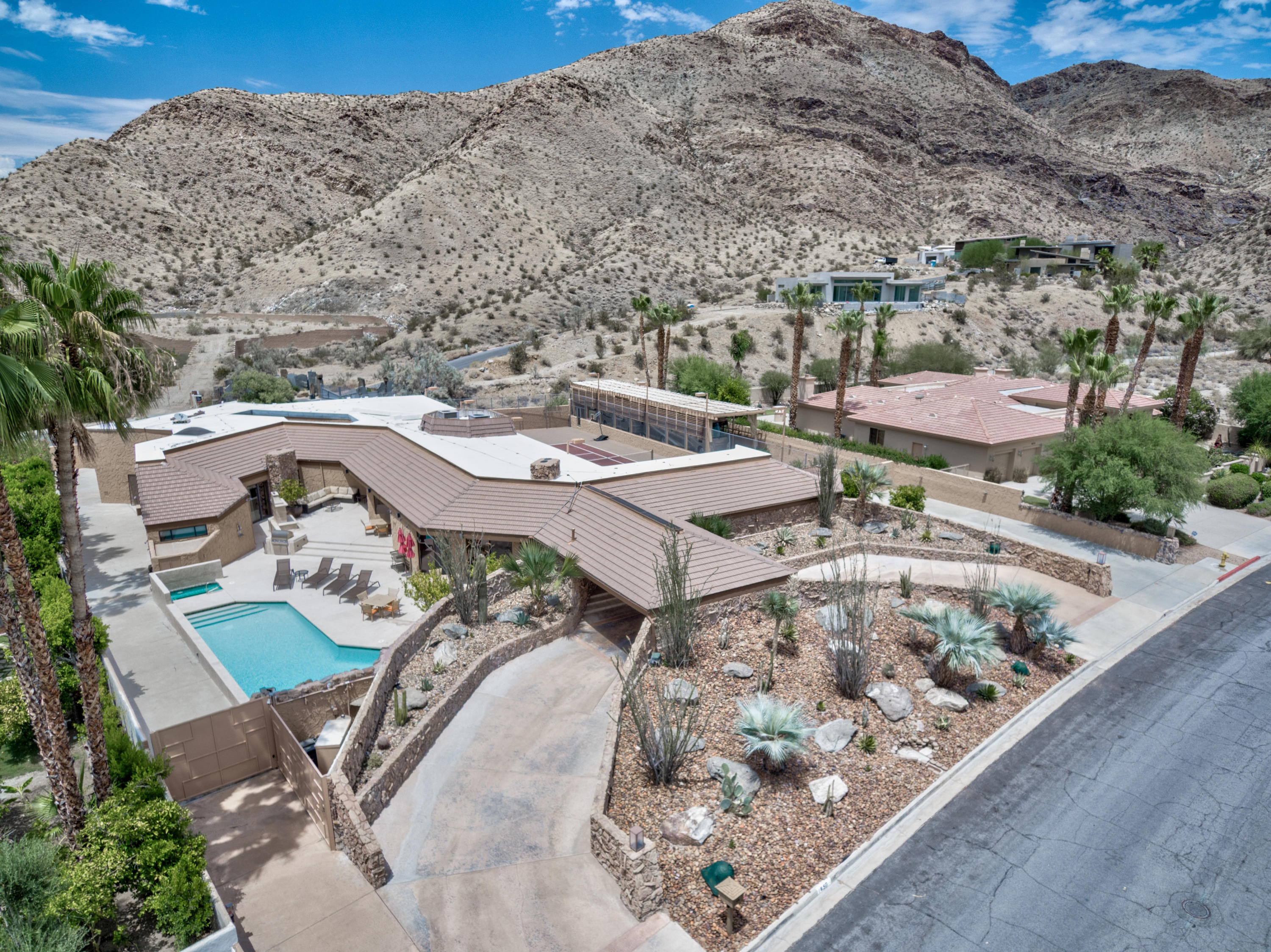 1650 Ridgemore Drive Palm Springs, CA 92264 - Photo 1 of 69 a view of a patio with furniture