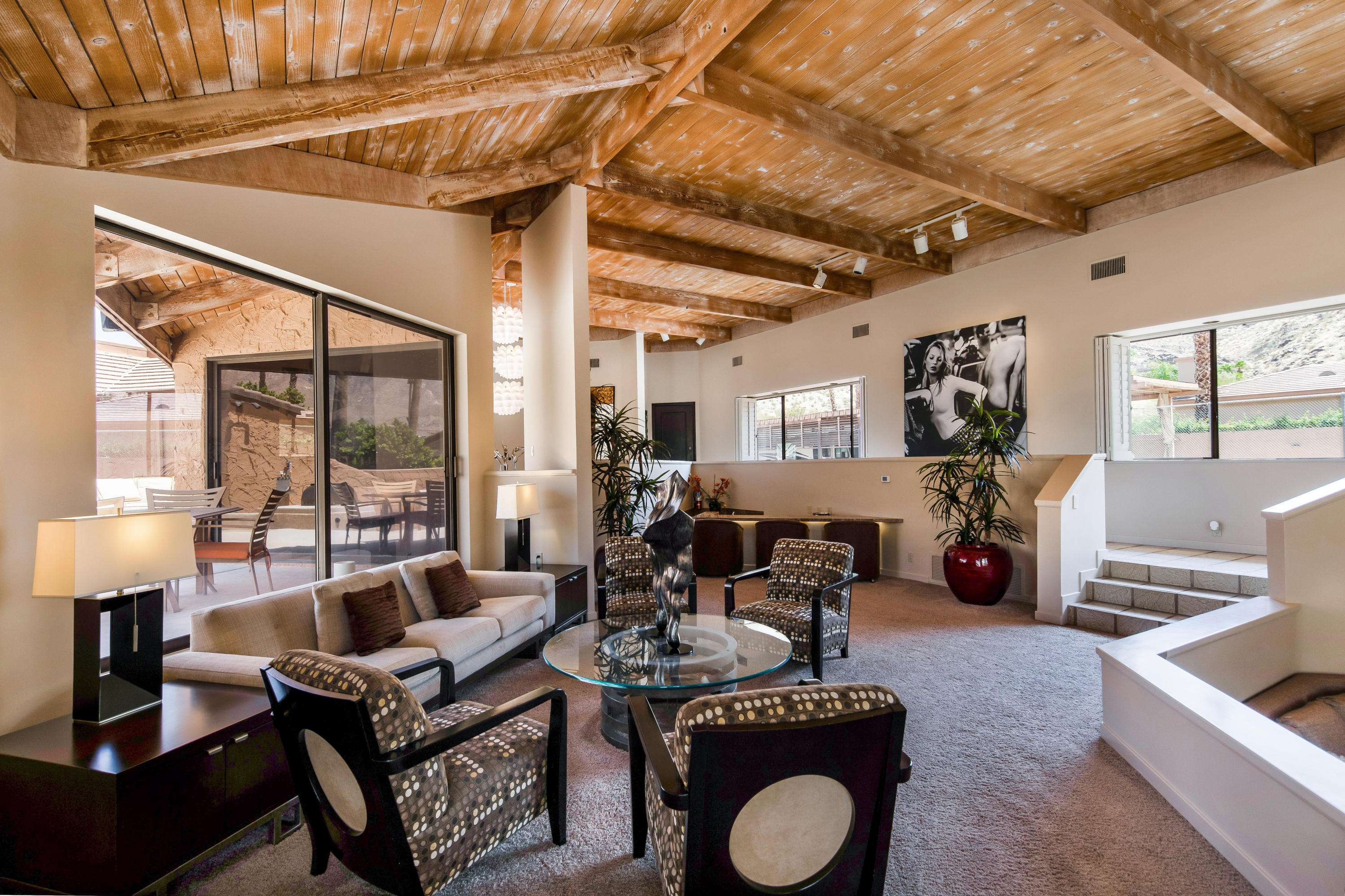 1650 Ridgemore Drive Palm Springs, CA 92264 - Photo 13 of 69 a living room with furniture and a flat screen tv
