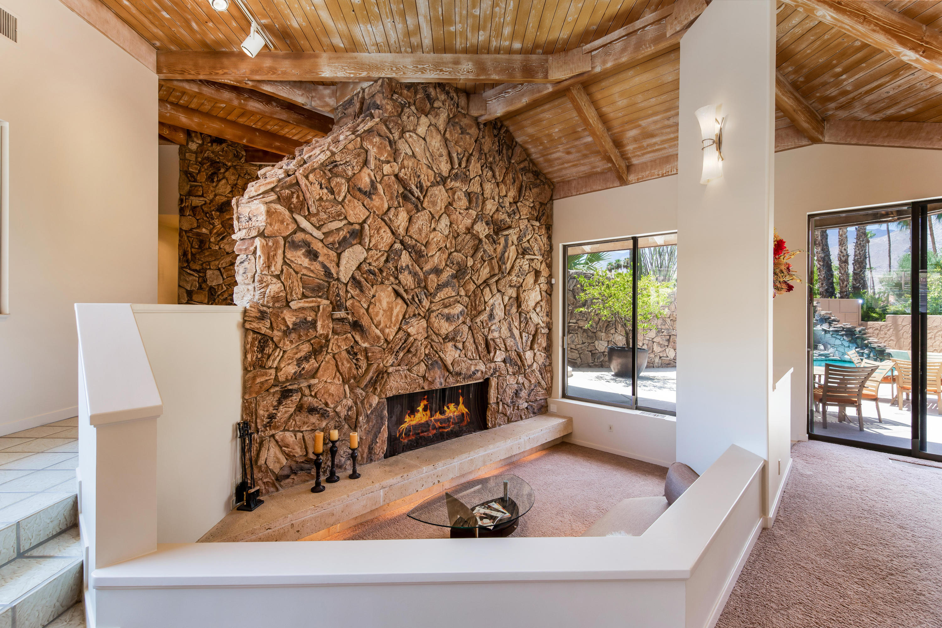 1650 Ridgemore Drive Palm Springs, CA 92264 - Photo 15 of 69 a living room with furniture and a fireplace