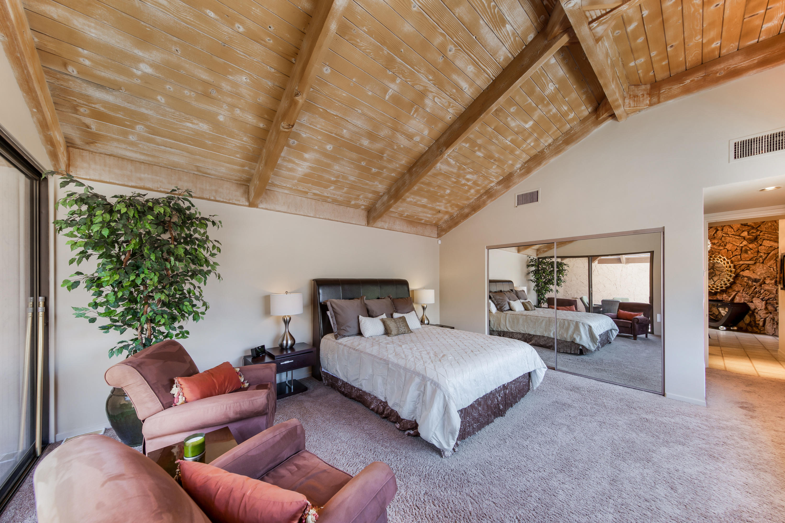 1650 Ridgemore Drive Palm Springs, CA 92264 - Photo 53 of 69 a bedroom with furniture and a large window