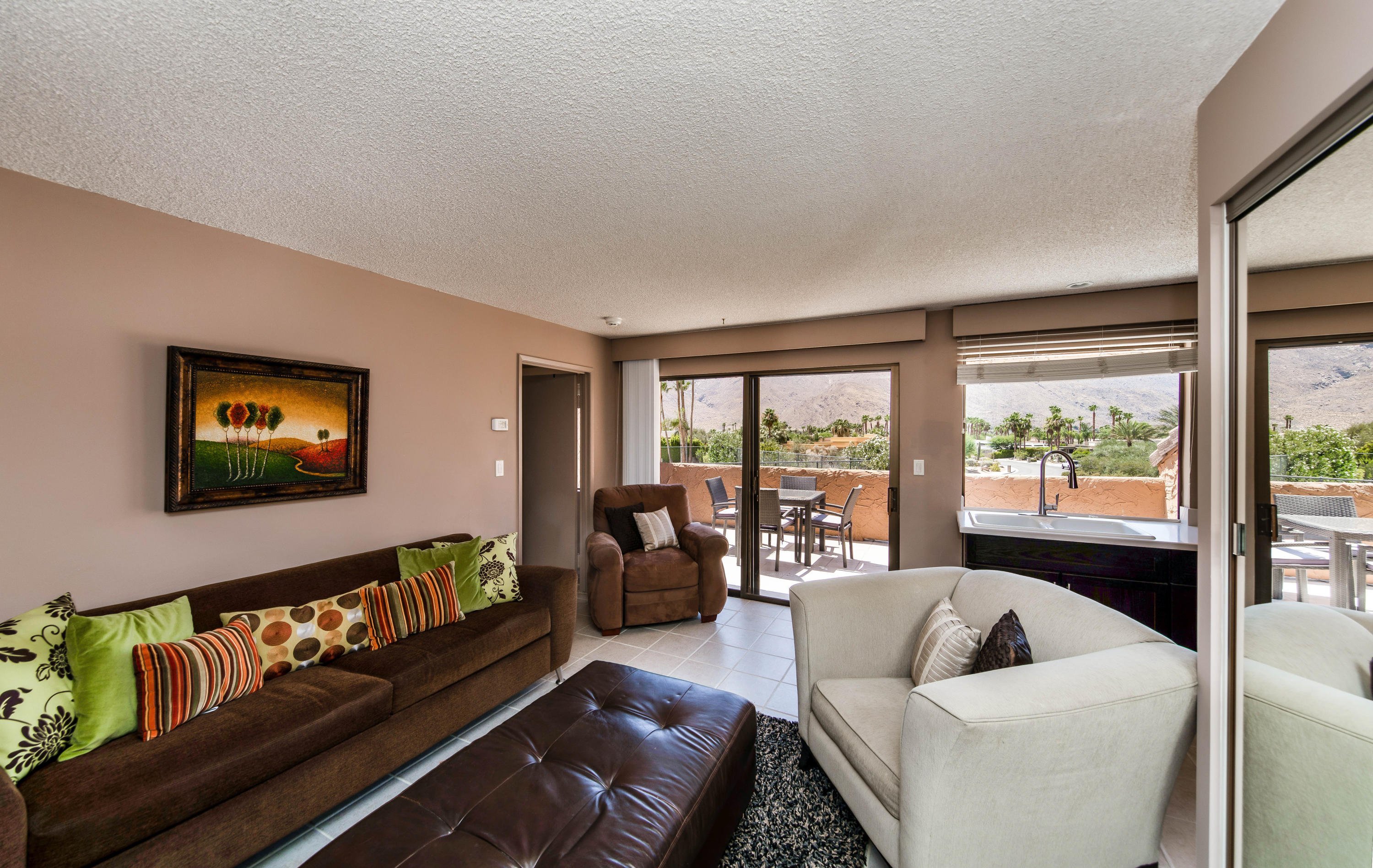 1650 Ridgemore Drive Palm Springs, CA 92264 - Photo 61 of 69 a living room with furniture and a large window