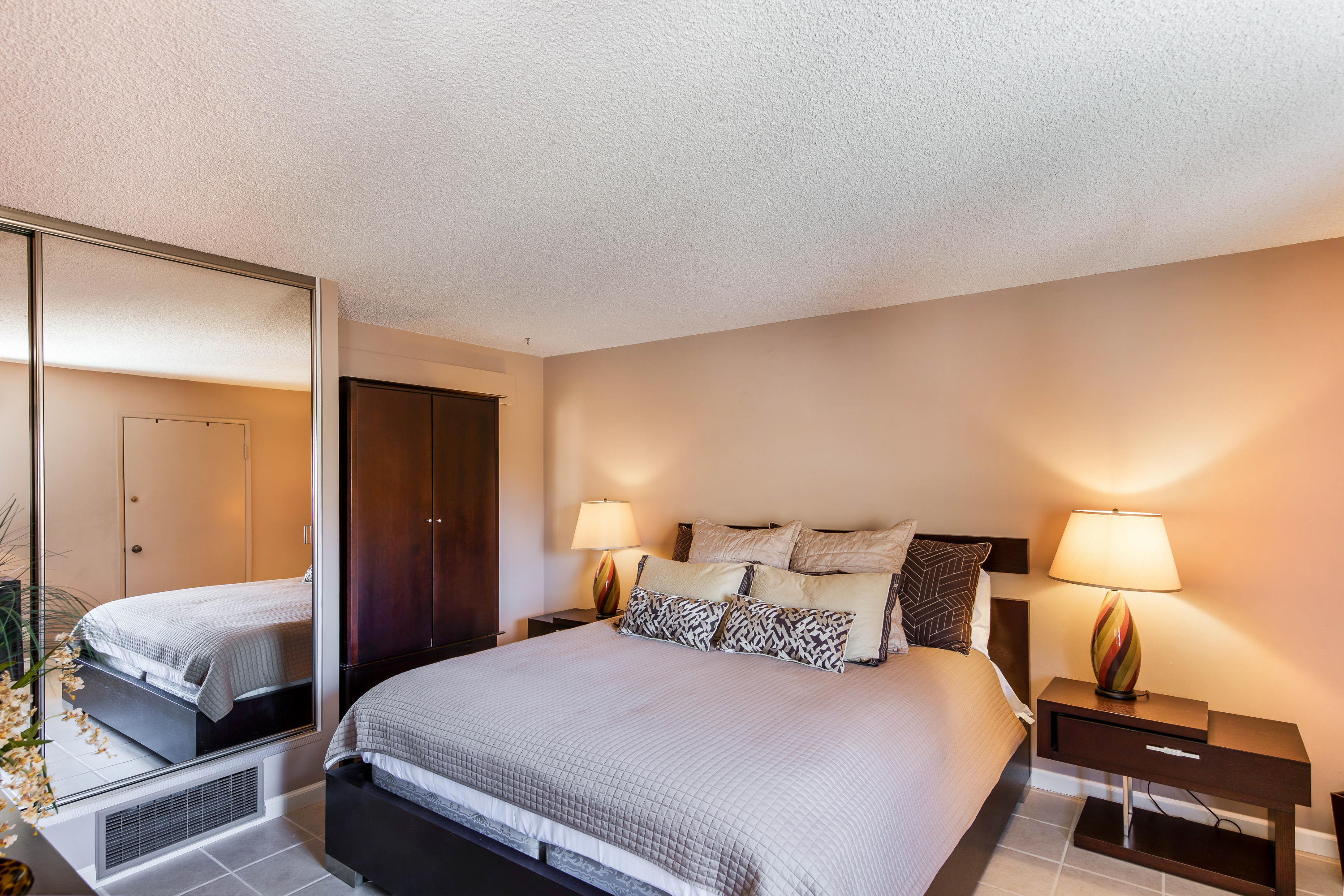 1650 Ridgemore Drive Palm Springs, CA 92264 - Photo 67 of 69 a bedroom with a bed and a night stand