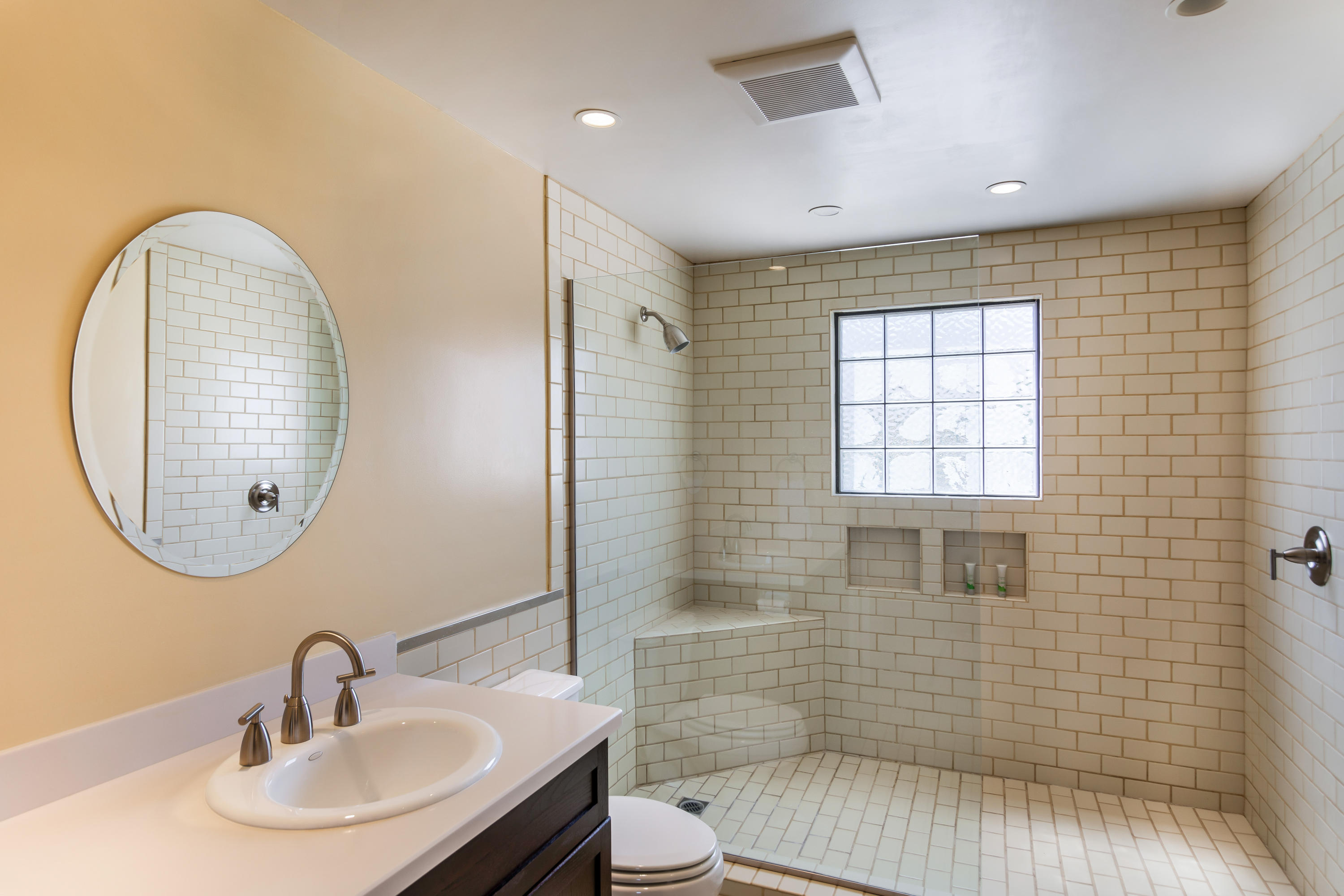 1650 Ridgemore Drive Palm Springs, CA 92264 - Photo 69 of 69 a bathroom with a sink a toilet and a mirror