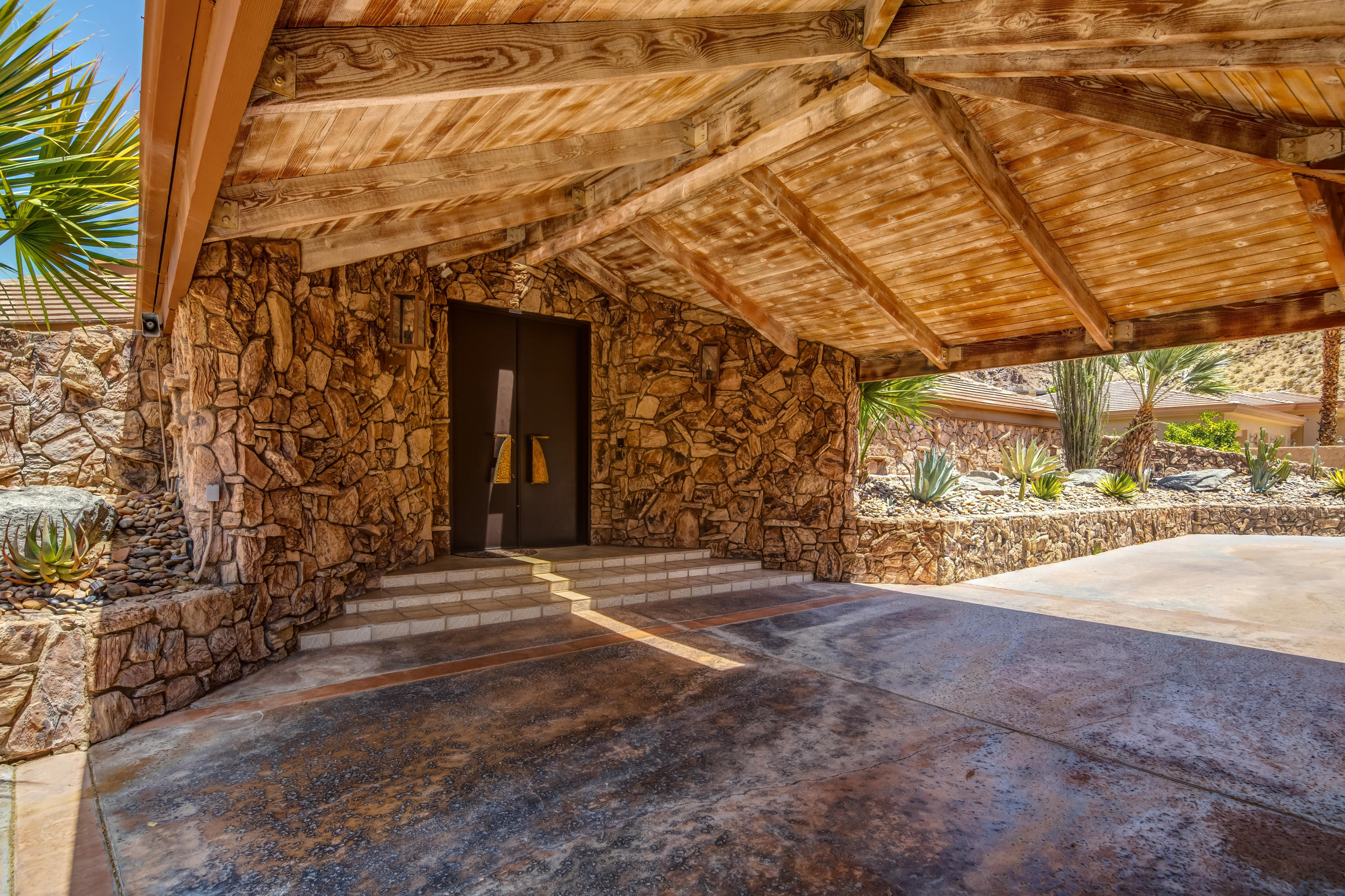1650 Ridgemore Drive Palm Springs, CA 92264 - Photo 8 of 69 a view of an entrance of the building