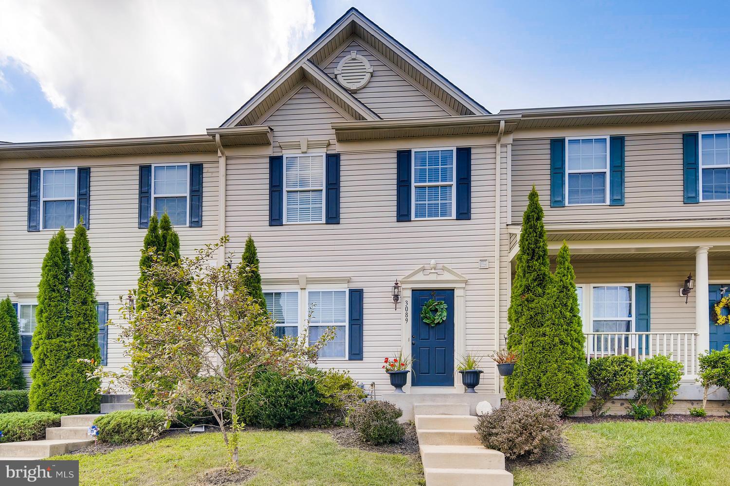 3089 Raking Leaf Drive Abingdon, MD 21009 - Photo 1 of 28 a front view of a house with garden