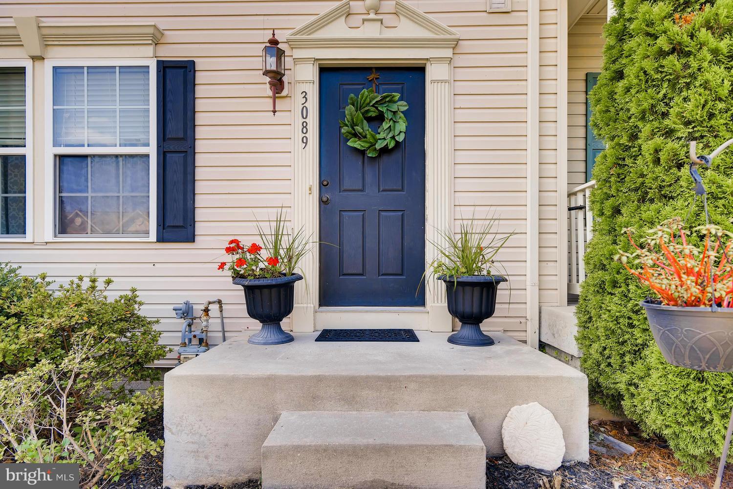 3089 Raking Leaf Drive Abingdon, MD 21009 - Photo 2 of 28 a view of a house with a potted plant and a potted plant
