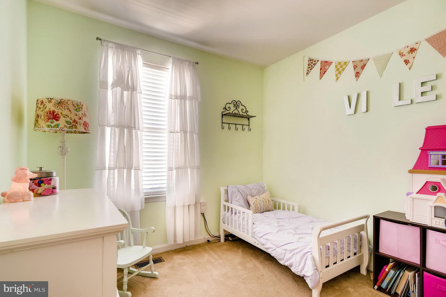 3089 Raking Leaf Drive Abingdon, MD 21009 - Photo 21 of 28 a bedroom with a bed and a window