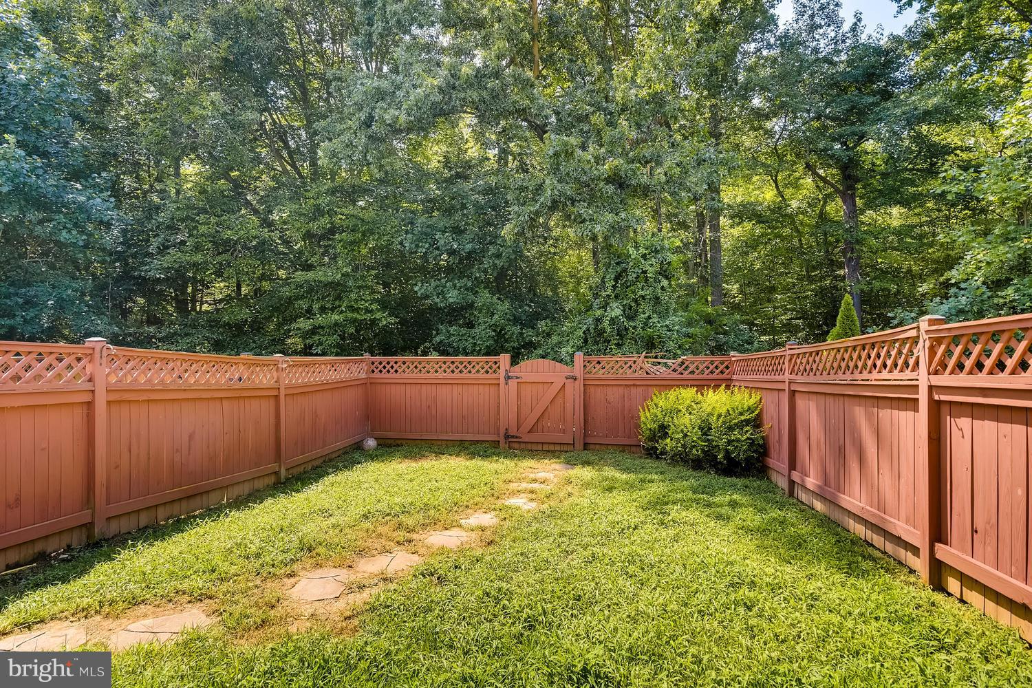 3089 Raking Leaf Drive Abingdon, MD 21009 - Photo 27 of 28 a view of a backyard with wooden fence