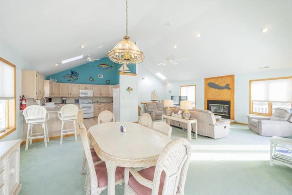 141 8th Street Avalon, NJ 08202 - Photo 18 of 21 a view of a dining room with furniture window and outside view