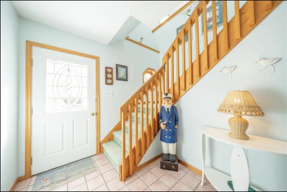 141 8th Street Avalon, NJ 08202 - Photo 5 of 21 a view of entryway and hall with wooden floor
