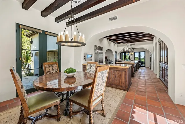 a utility room with cabinets washer and dryer