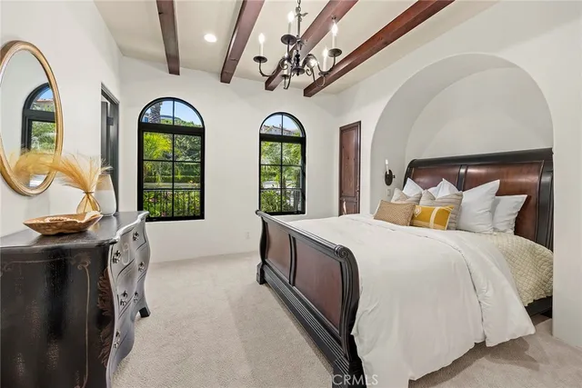 a white bath tub sitting next to a white sink
