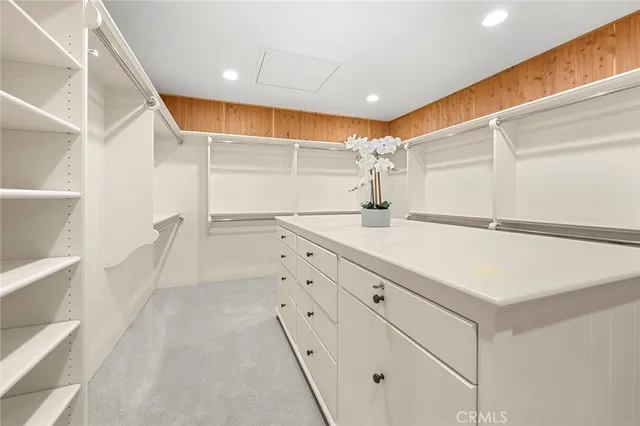 a view of a balcony with lake view and a potted plant