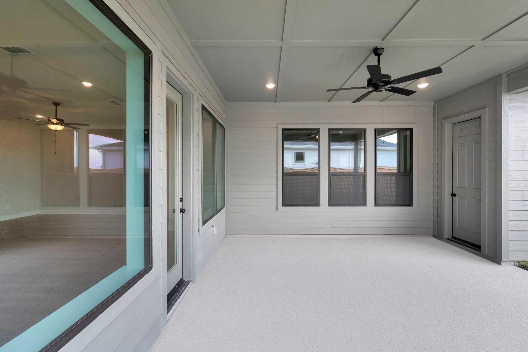 2722 Cottage Place Rosharon, TX 77583 - Photo 9 of 50 a view of an empty room with glass door and balcony