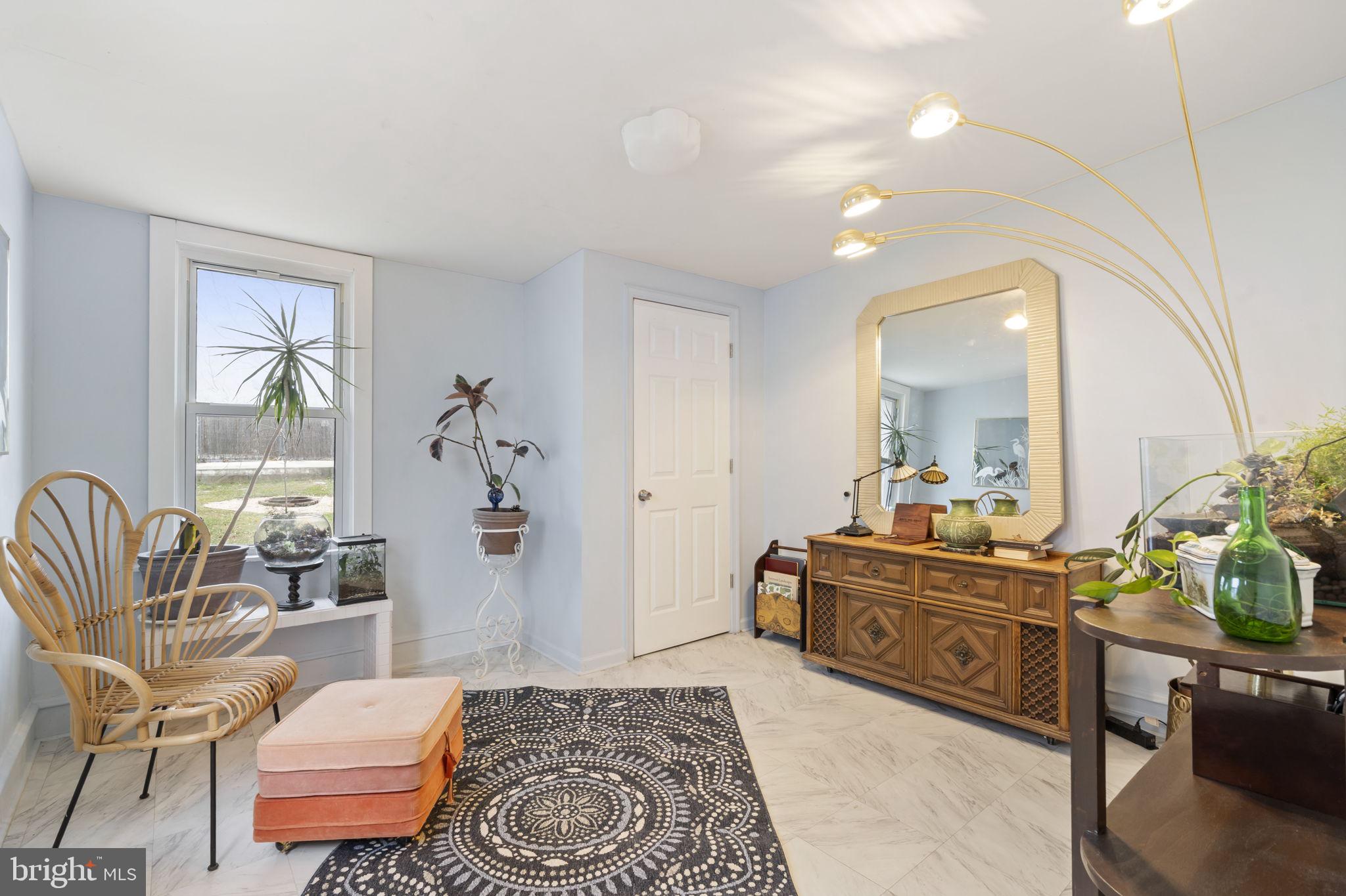 307 Johnson Avenue Upper Chichester, PA 19061 - Photo 13 of 42 a living room with furniture and wooden floor