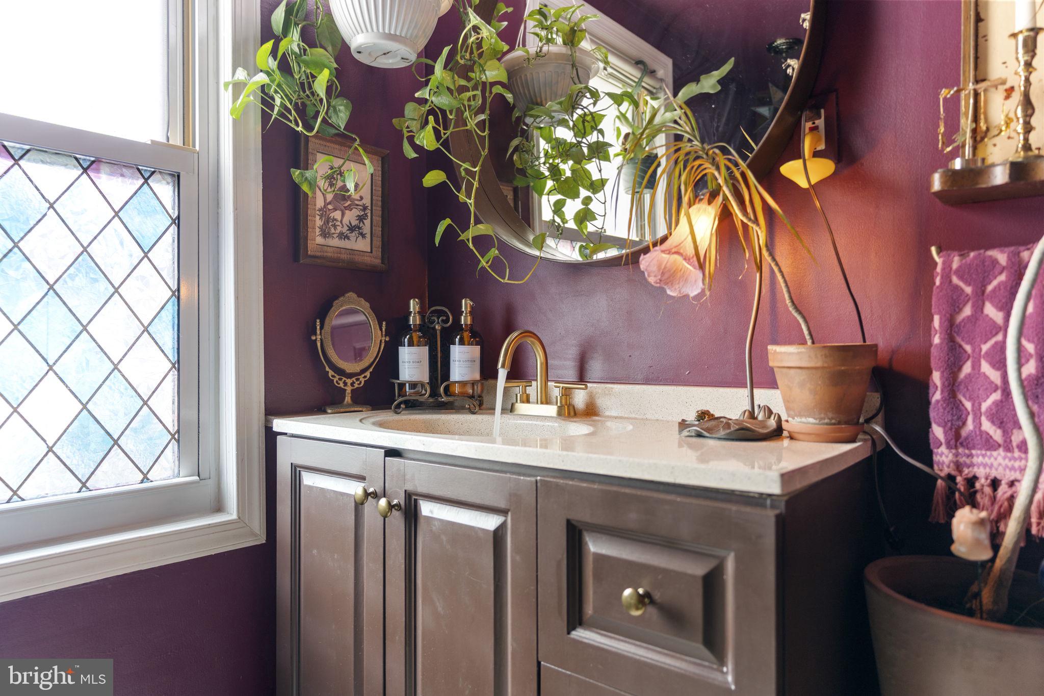 307 Johnson Avenue Upper Chichester, PA 19061 - Photo 29 of 42 a utility room with a sink and a mirror