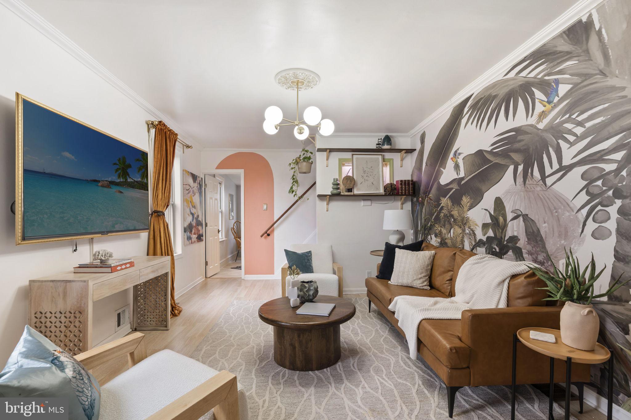 307 Johnson Avenue Upper Chichester, PA 19061 - Photo 8 of 42 a living room with furniture and a flat screen tv