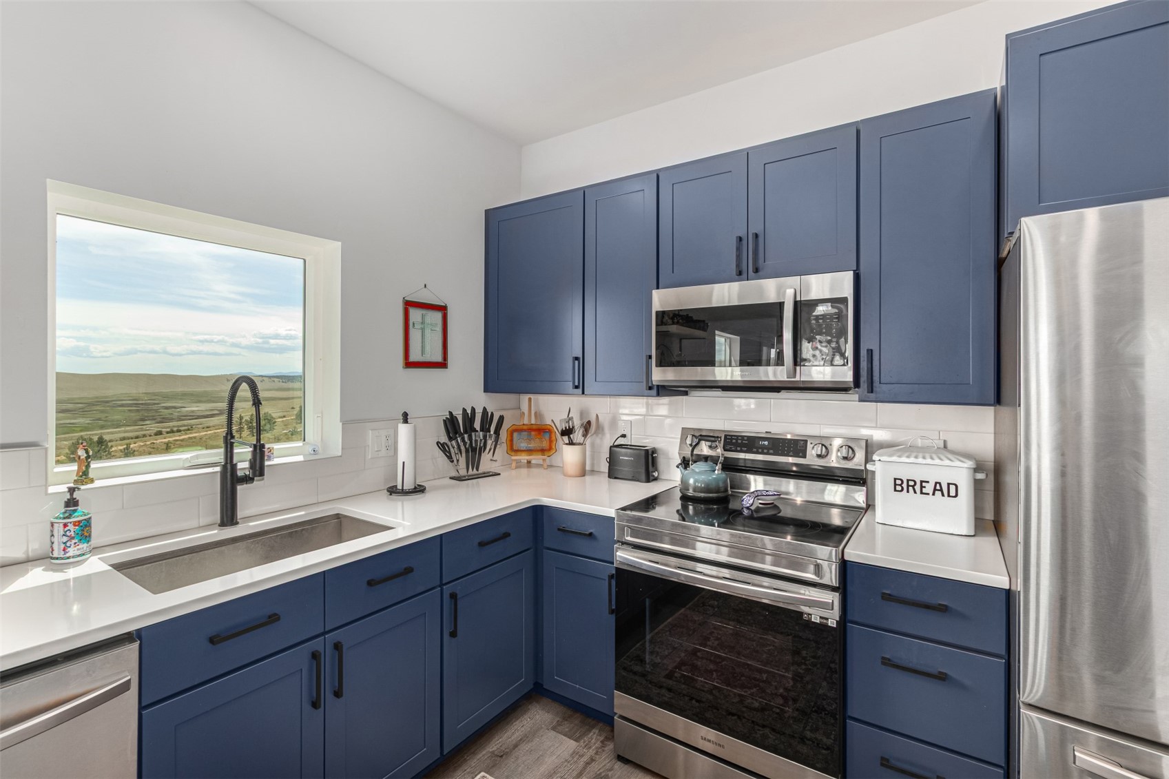 344 Redhill Road Fairplay, CO 80440 - Photo 14 of 44 a kitchen with a sink stove and microwave
