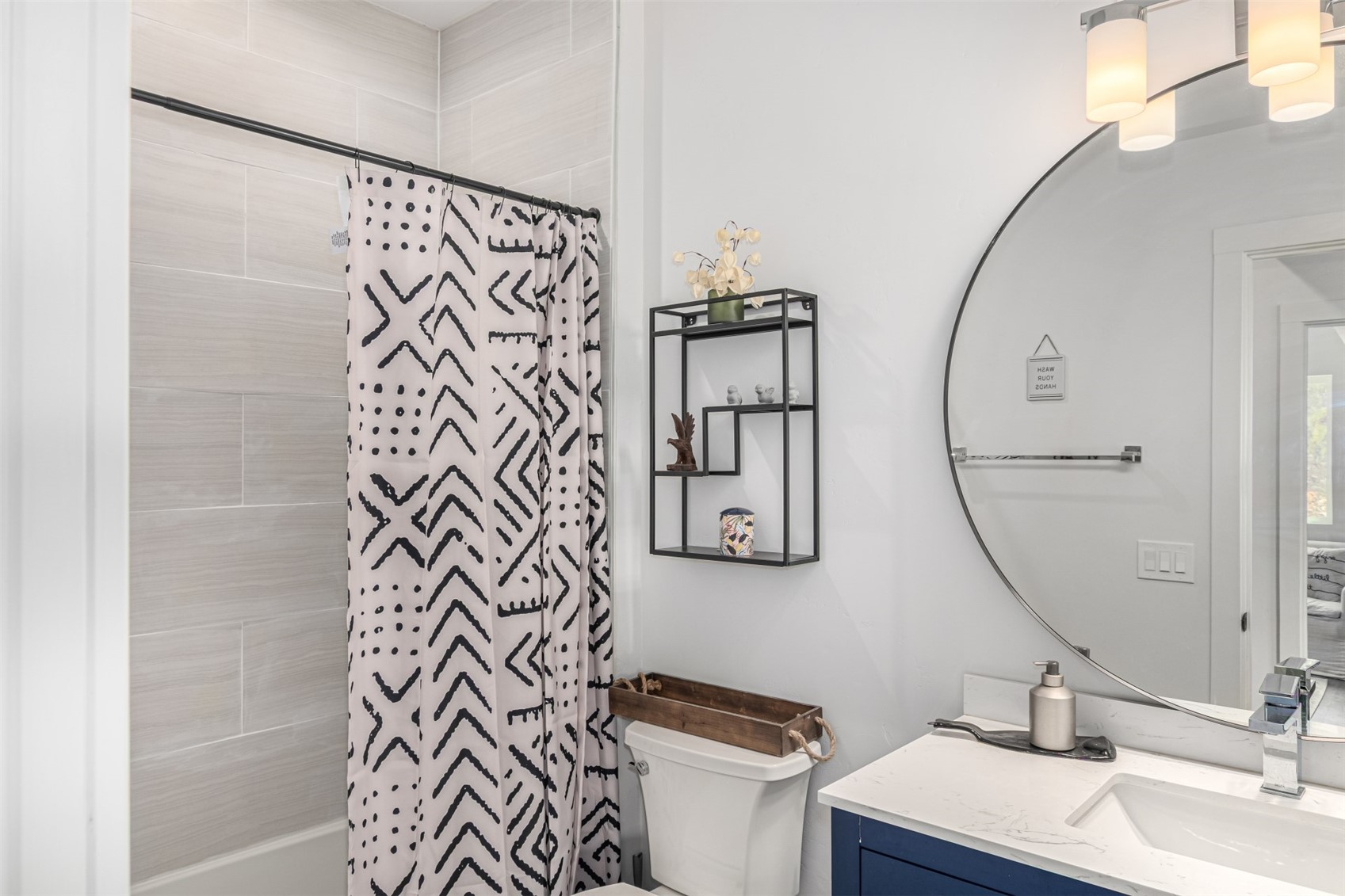 344 Redhill Road Fairplay, CO 80440 - Photo 17 of 44 a bathroom with a sink and mirror with toilet