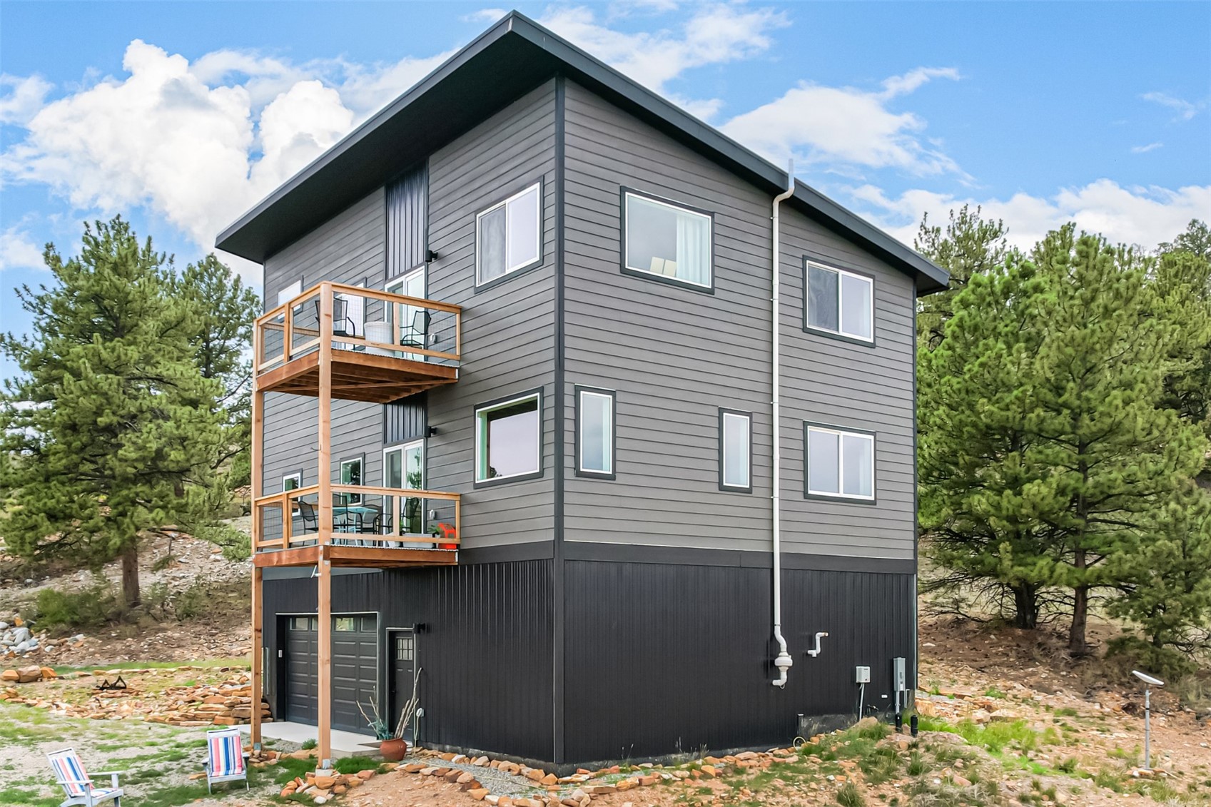 344 Redhill Road Fairplay, CO 80440 - Photo 40 of 44 a front view of a house with parking area