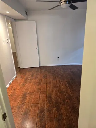 a bathroom with a shower a toilet and a sink