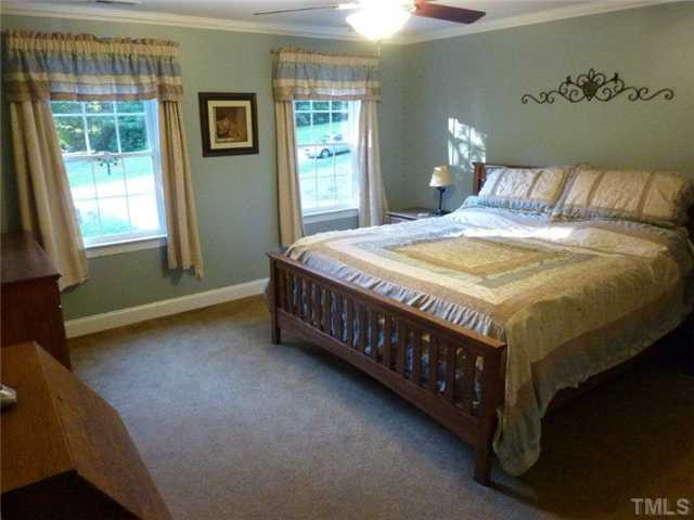 9420 Springdale Drive Raleigh, NC 27613 - Photo 10 of 25 Master Bedroom with New Paint and Carpet, Cedar Lined Closets Master Bedroom