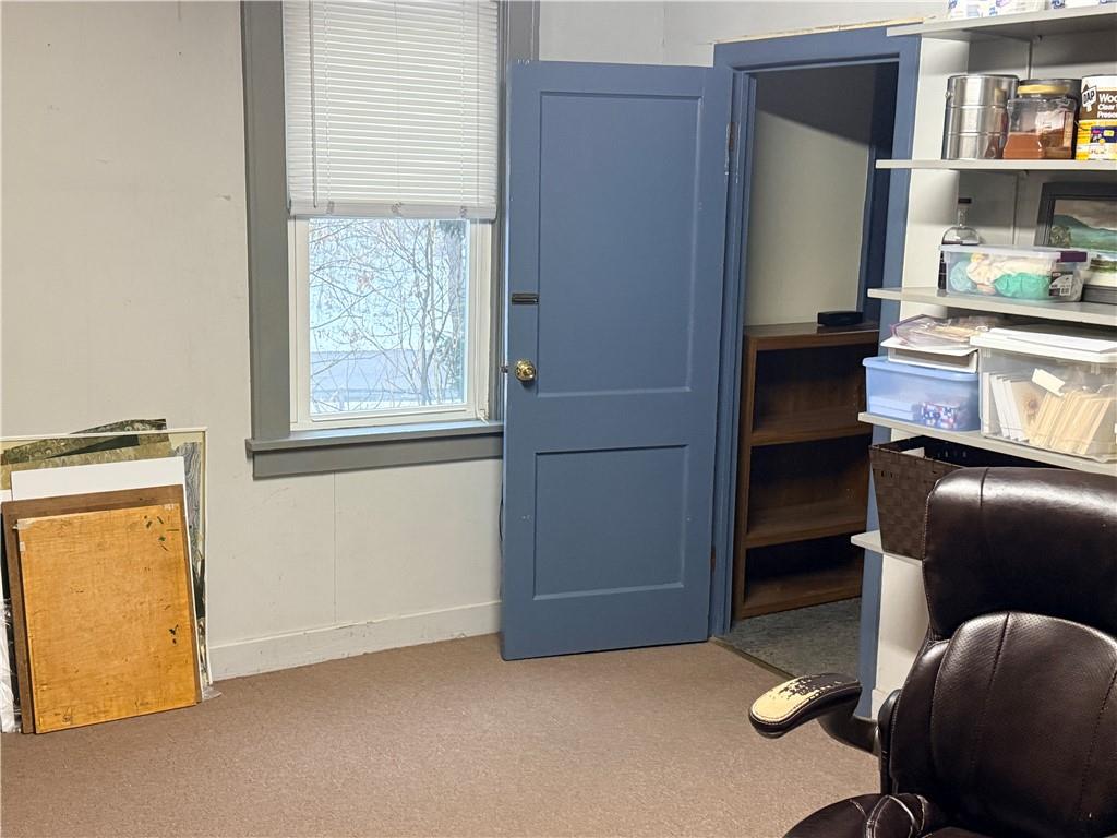 321 Butler Road Kittanning, PA 16201 - Photo 11 of 28 a view of an empty room with workspace and a window