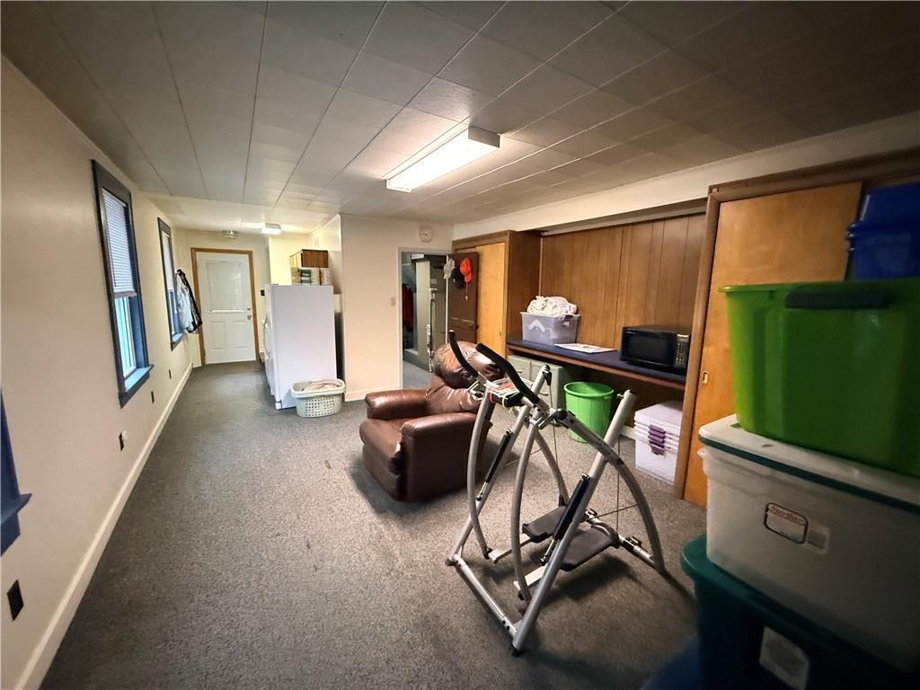 321 Butler Road Kittanning, PA 16201 - Photo 15 of 28 a view of a livingroom with furniture hardwood floor and a flat screen tv