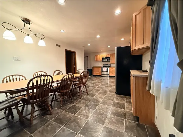 a view of a dining room with furniture