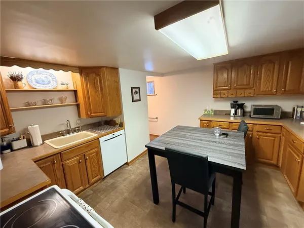 a bedroom with a bed and dresser