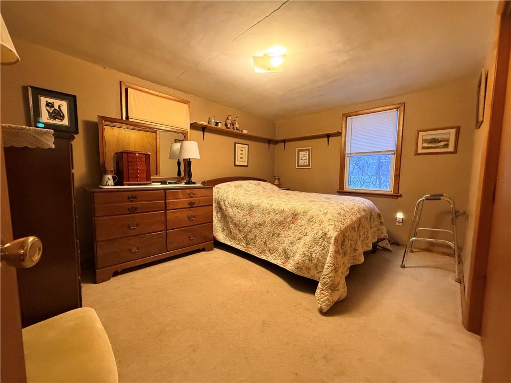 321 Butler Road Kittanning, PA 16201 - Photo 27 of 28 a bedroom with a bed and dresser